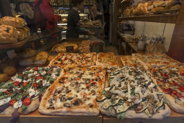 Shop window with baked pizzas, Venice, Veneto, Italy