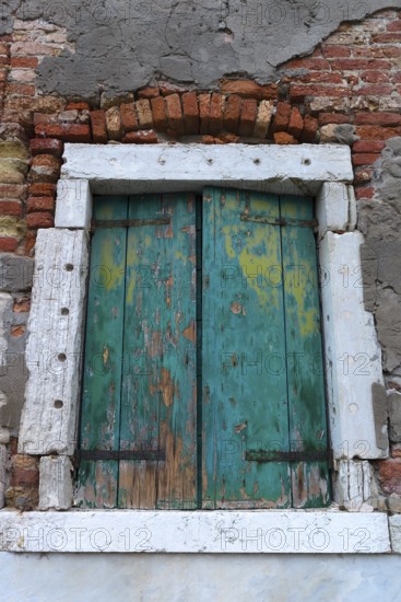 Dilapidated window façade in the old town, Venice, Veneto, Italy