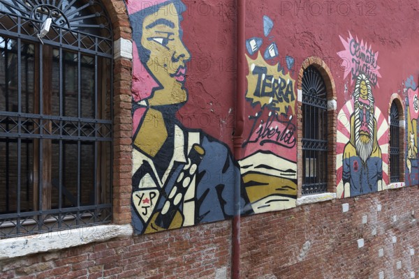 Graffiti on a factory wall, Venice, Veneto, Italy