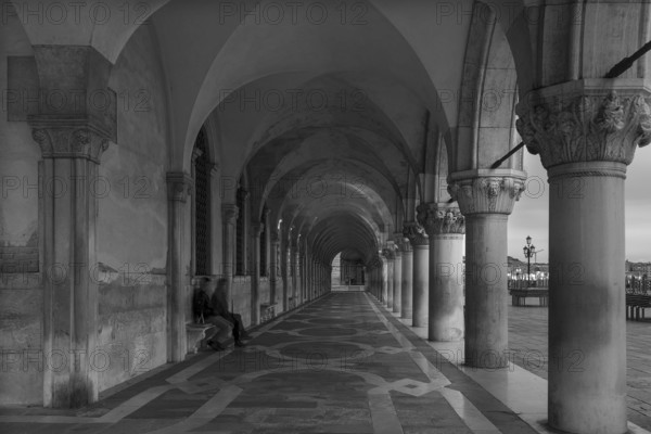 Arcade of the Doge's Palace early in the morning, black and white, Venice, Veneto, Italy