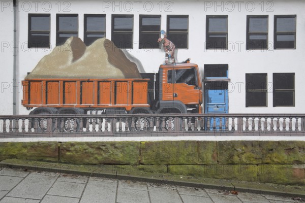 Mural construction by Jaune 2020, alleyway art, graffiti, balustrade, dump truck, construction site