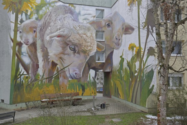 Mural sheep from CASE 2022, graffiti, street art, sheep figures, dandelions, meadow with yellow
