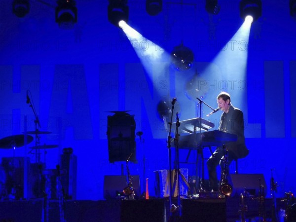Musician Hans-Jürgen Buchner, performance with his group Haindling, here at the Plassenburg concert
