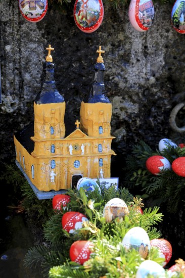 The monastery church Vierzehnheiligen built as a model in an Easter fountain, Franconian