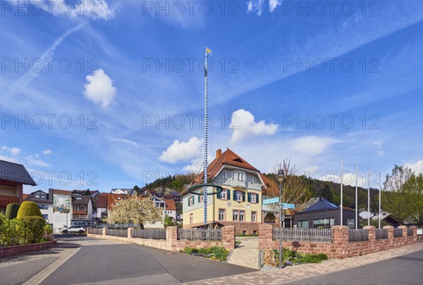 Town hall, maypole, streets, commercial buildings, residential buildings, single-family house,
