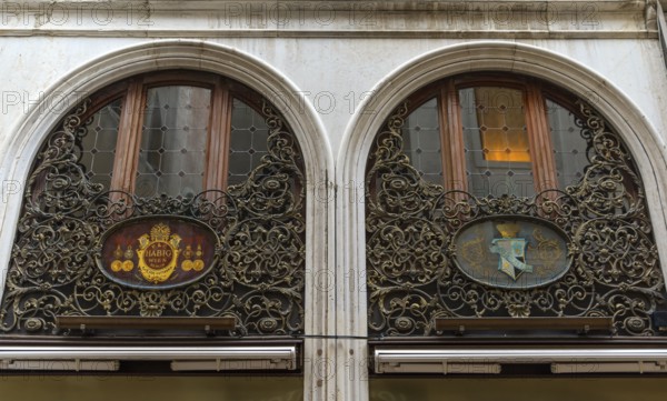 Artfully forged window grilles at the branch of the Wiener Habig Hutfabrik, since 1882 in Venice,