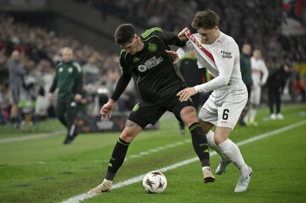 Tackle, action Tomas Cvancara Celtic Glasgow FC (11) vs Angelo Stiller VfB Stuttgart (06) shirt