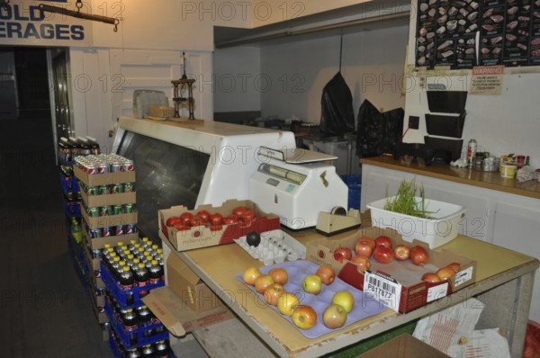 An ancient shop counter with fresh fruit, vegetables and preserves ready for sale, Mitchell,