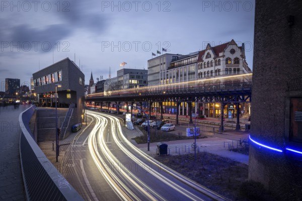 Café ALEX Hamburg Überseebrücke an den Landungsbrücke at the Blue Hour with light strips from