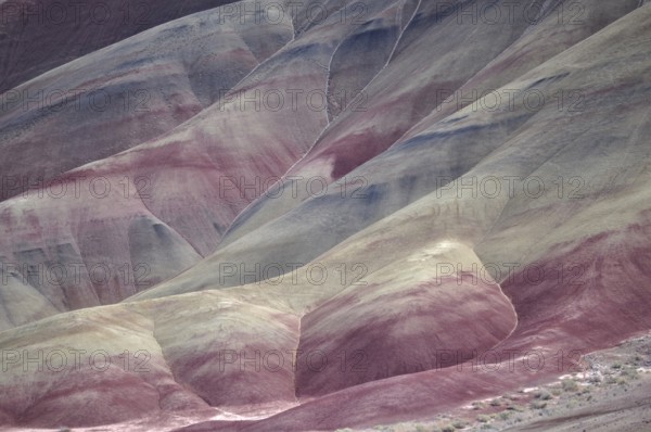 Abstract patterns in red and beige colored rocks, John Day Fossil Beds National Monument, Painted