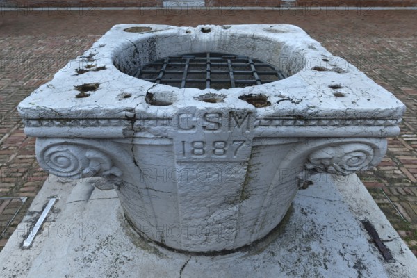 Historic fountain from 1887 in the courtyard of the cloister of the Madonna dell'Orto parish