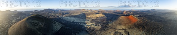 Picturesque volcanic landscape with volcanic craters and lava fields in morning light, Montaña