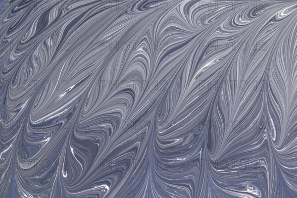 A captivating abstract design in grey and white, featuring elegant swirling patterns. This fluid