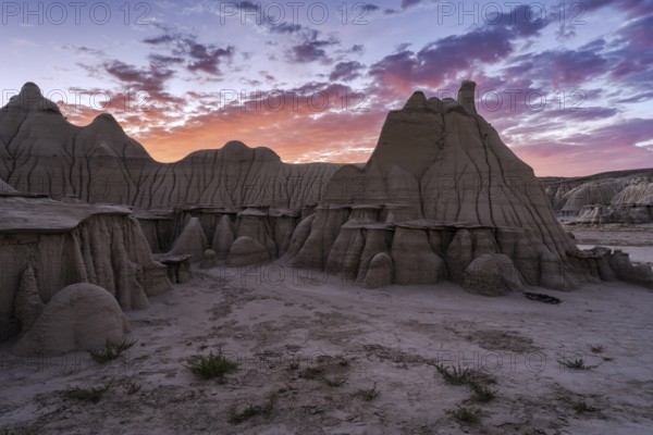 Stunning sunset illuminating the unique rock formations in the Bisti/De-Na-Zin Wilderness in New