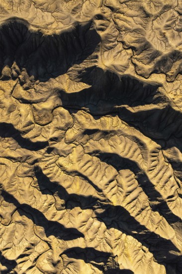 Stunning aerial view of Caineville Mesa in Utah captures intricate desert textures and patterns