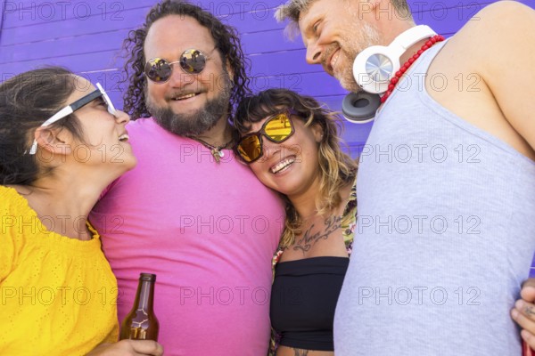 A joyful group of LGBTQIA+ friends sharing happiness, love, and diversity. They celebrate pride in