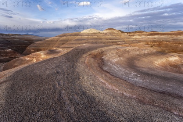 Explore the stunning bentonite hills in Hanksville, Utah. These unique formations showcase layered