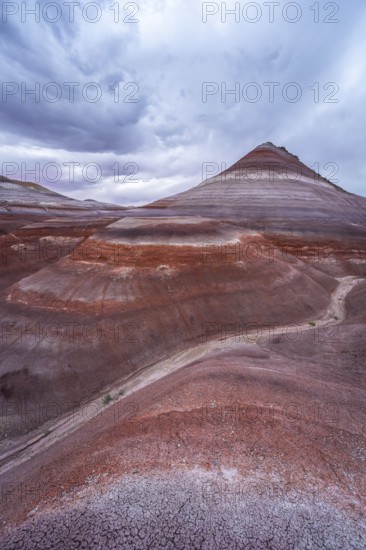 Explore the stunning layers and vibrant colors of the Hanksville Bentonite Hills in Utah. These