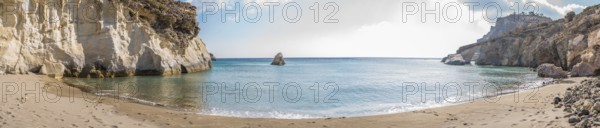 Panoramic image of the secluded beach Gerontas on the Island of Milos in Greece, showcasing
