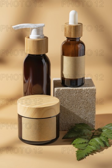 A sleek arrangement of cosmetic bottles on a beige background, featuring elegant packaging with