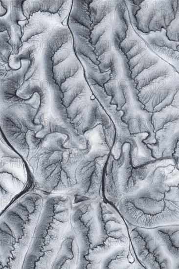 Captivating aerial shot of the unique, undulating terrain at Moonscape Overlook in Utah, showcasing