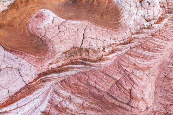 Discover the striking abstract formations and vibrant colors of desert rock textures at Vermilion