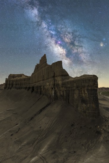A mesmerizing night view capturing the Milky Way sprawling above the striking rock formations of