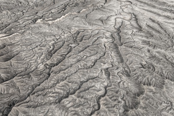 Aerial photograph capturing the intricate, textured ridges of Caineville Mesa near Hanksville,