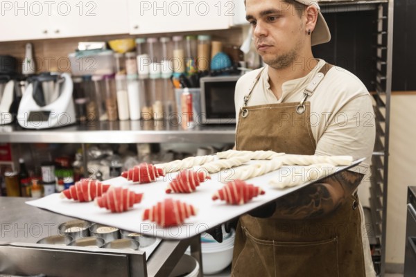 A skilled baker in a cozy Italian bakery prepares fresh pastries and bread The warm atmosphere