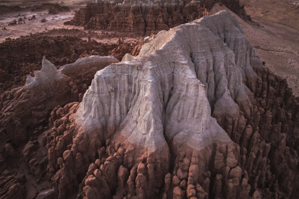 A majestic aerial shot capturing the unique rock formations of Goblin Valley State Park in Utah,