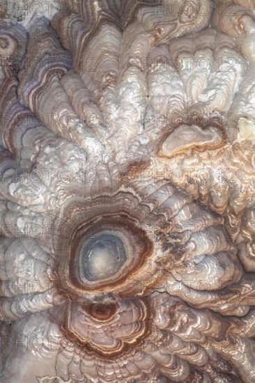 A stunning aerial view captures the intricate patterns and rich colors of bentonite sandstone in