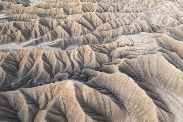 Aerial shot captures the intricate natural patterns and textures of Caineville Mesa near Hanksville