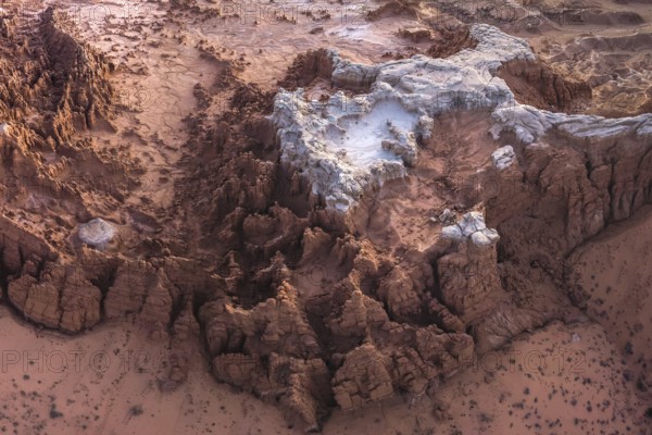 Aerial view of the unique, eroded rock formations in Goblin Valley State Park, Utah, showcasing the