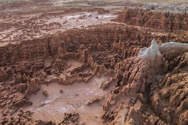 An aerial shot of Goblin Valley State Park in Utah, showcasing the park's unique, eerie geological