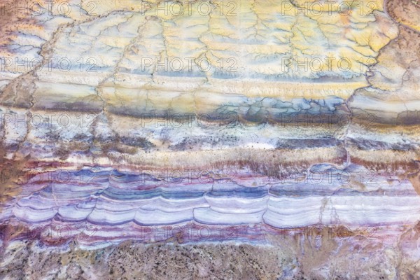 Explore the captivating textures of Vermilion Cliffs National Monument in Arizona. This aerial view