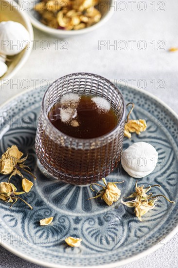 A delectable homemade vanilla mini zephyr-marshmallow filled with rose jam, paired with a