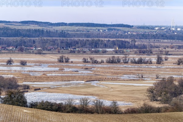 Ice and snow-covered foothills of the Oder in the Lower Oder Valley National Park. Schwedt,