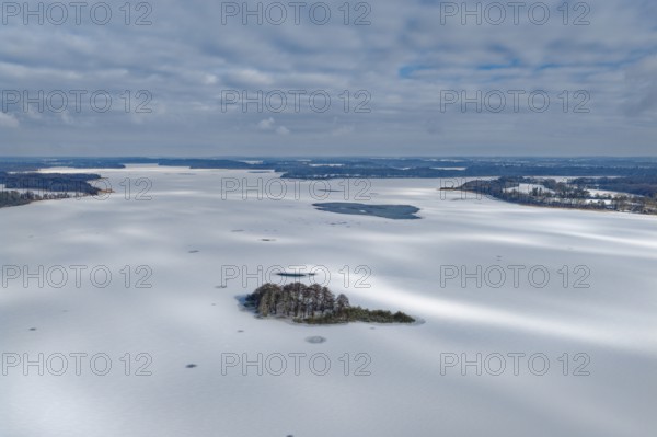 There is snow on the frozen Schaalsee near Zarrentin in the UNESCO Schaalsee Biosphere Reserve. In