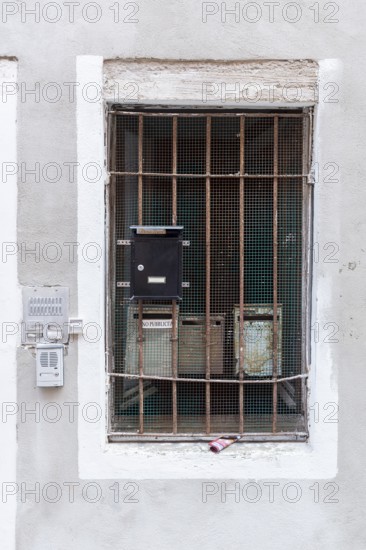 Mailboxes behind a latticed window, Venice, Veneto, Italy