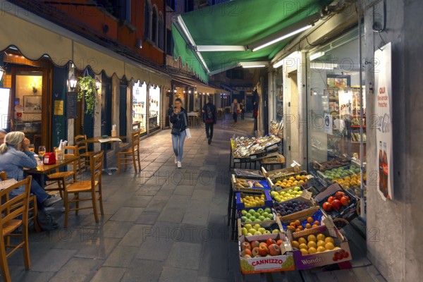 Fruit shop in the evening alleys, Venice, Veneto, Italy