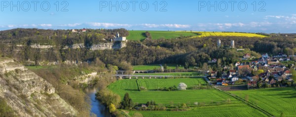 View of the river Saale, the village of Saaleck and the ruins of Rudelsburg and Saaleck castles,