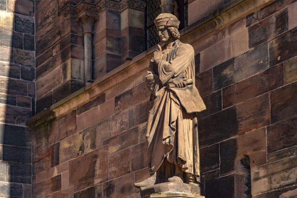 Erwin von Steinbach, sculpture on the south portal of Strasbourg Cathedral in Strasbourg, Alsace,
