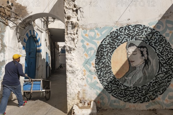 Tunis, Tunisia 4th May, 2024 Decorative street art in the narrow streets of Tunis Medina, a UNESCO