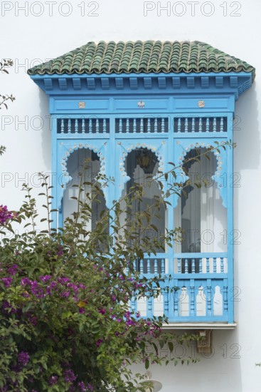 May 17th 2024. Sidi Bou Said, Tunisia. Window design detail of blue and white architecture part of
