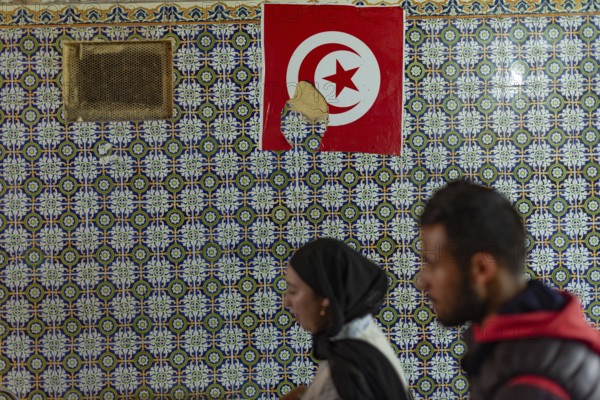 Tunis, Tunisia 2nd May, 2024 Typical Tunisian decorated wall of a restaurant with a Tunisian flag