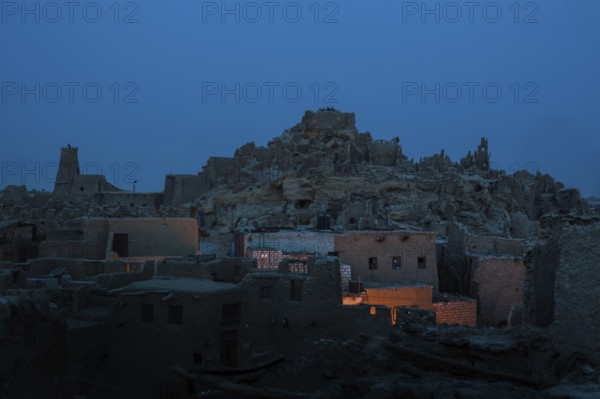 View of the mud brick houses at night inside the ancient fortress of Shali in Siwa Oasis, The Siwa