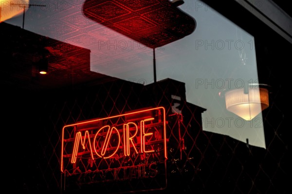 Oxford, England, UK. February 6th, 2020 More, Florescent sign for a local bar or café
