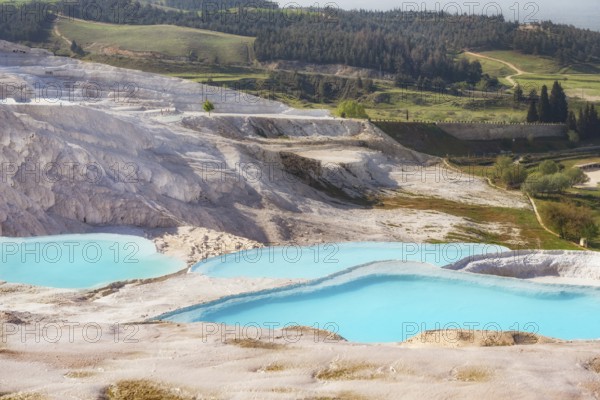 Pamukkale Travertine Terraces, amazing aqua blue pools of thermal mineral-rich spring water set