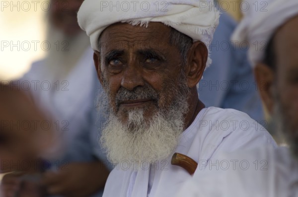 Nizwa, Oman. May 30th 2014 Portrait of an old Omani farmer at the Friday livestock market, Nizwa,