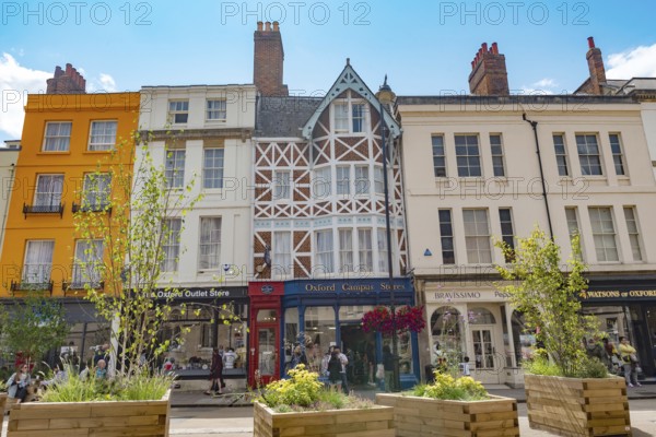 Oxford, England. July 25th 2023 Beautiful historical architecture and modern shops along Broad